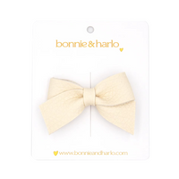 bow clip | cream